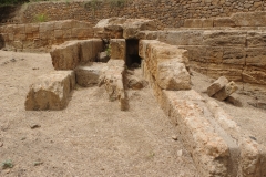 Water channel leading out of the walls near the tower opposite Gate I.