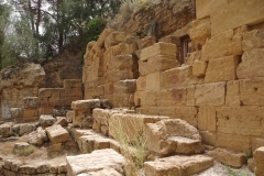 Rear wall and basins at the rock-cut sanctuary.