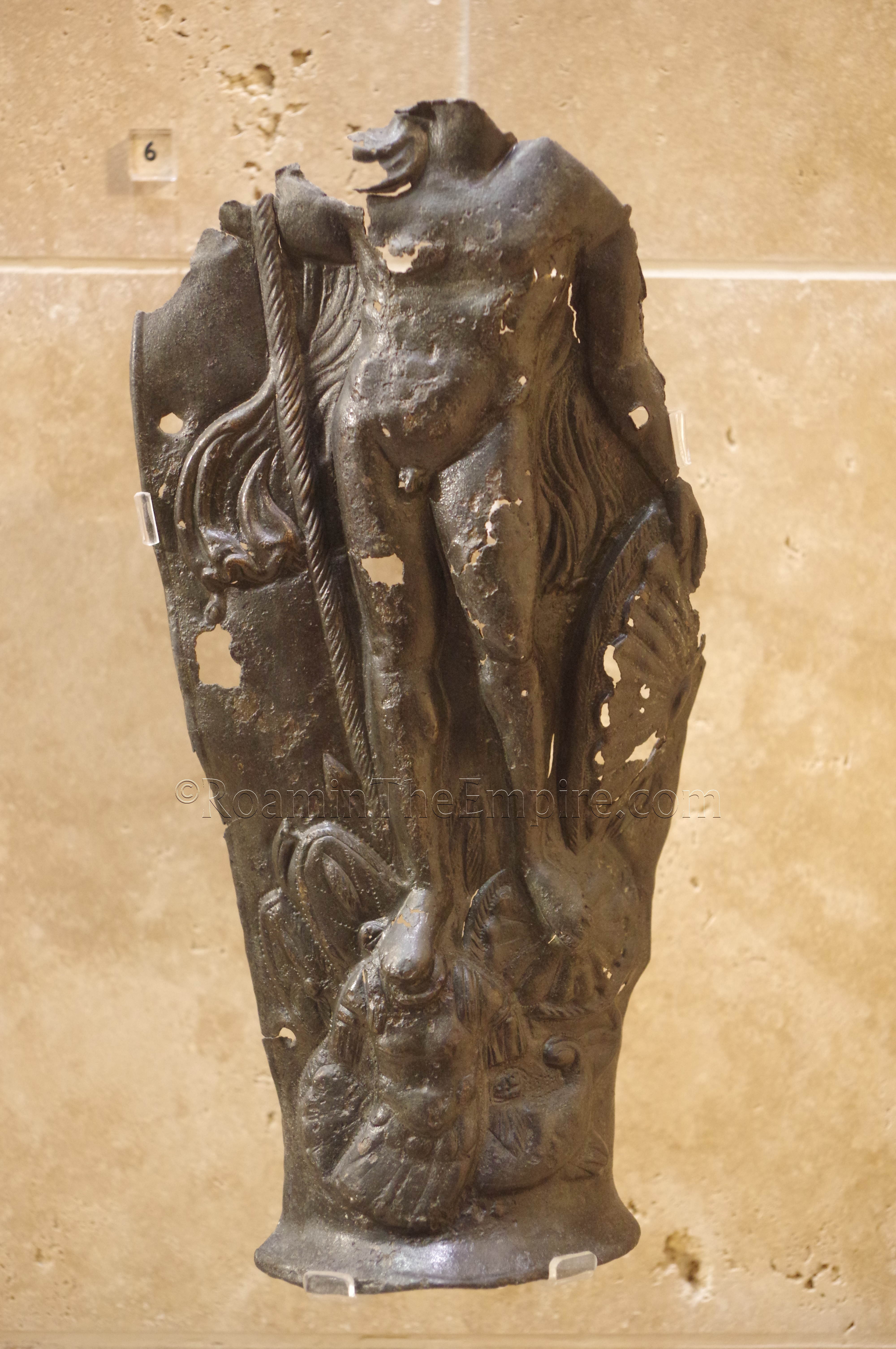 Bronze element depicting a deity.  Aquincum Archaeological Museum.