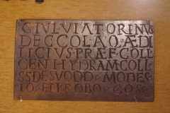 Inscription for the hydraulis noting the donation of the instrument by Giaus Julius Viatorinus, a decurion, aedile, and praefect of the collegium centonariorum in 228 CE. Found in Aquincum. Archaeological Museum of Aquincum.