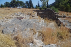 Steps leading from lower terrace to upper terrace, altar of the Temple of Apollo Deiradates, and Christian church constructions.