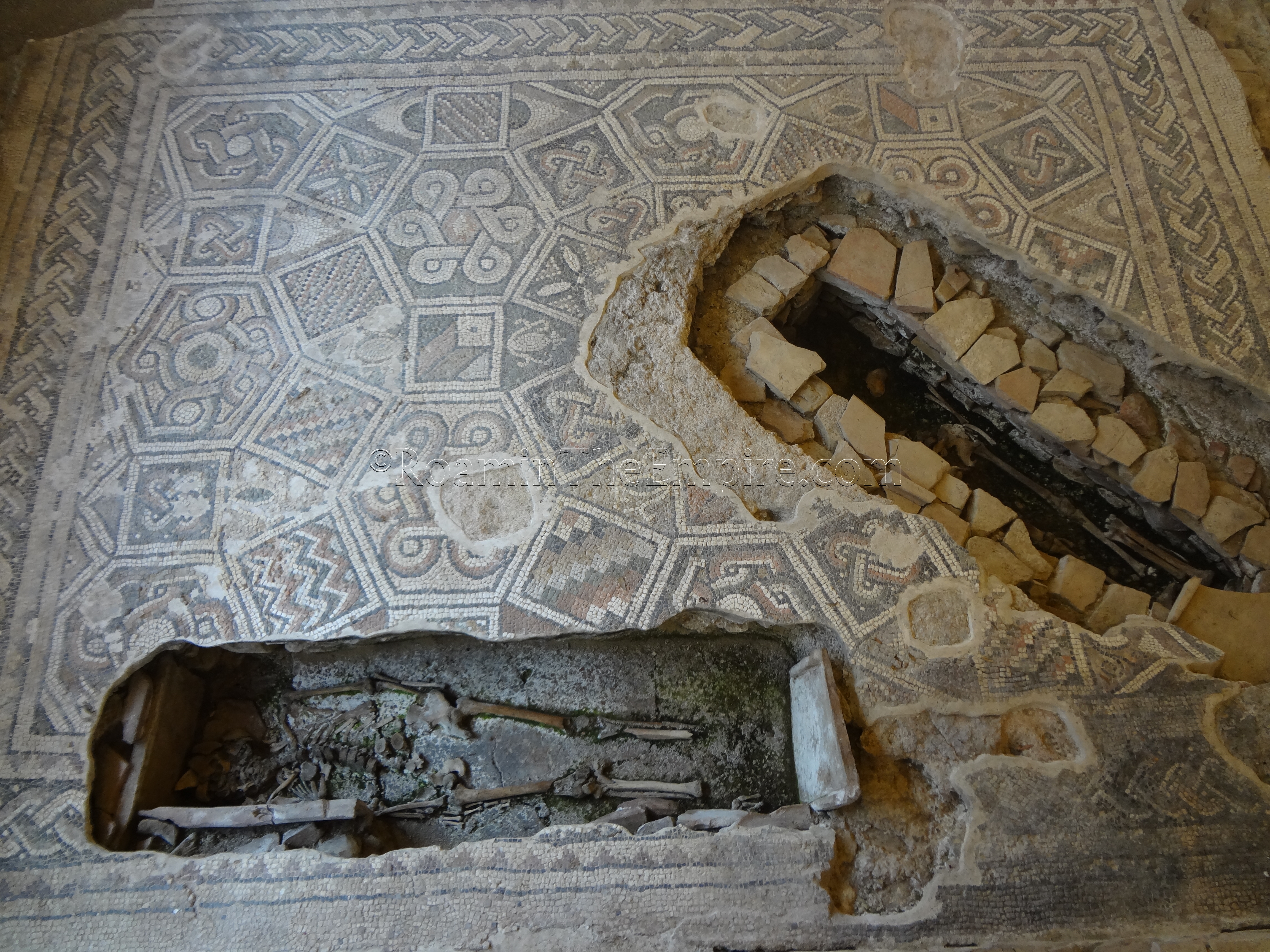 Medeival graves cut into the mosaics at the Domus del Chirurgo.