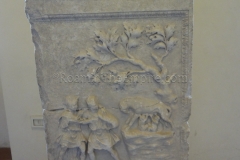 Augustan era marble altar depicting the she-wolf feeding Romulus and Remus beneath a fig tree in front of Mars and Faustolus.