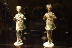 Bronze statuettes of dancers.