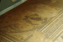 Detail of the bear and bird mosaic from the Domus del Mosaico del Oso y los Pájaros.