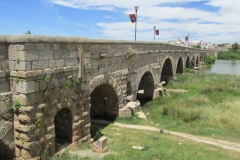 Western portion of the Guadiana River bridge with signs of restoration.