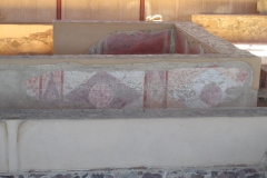 Room and corridor with painted decoration in the Casa del Mitreo.