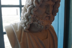 Bust of Serapis dated to the late Antonine period. Found in Avignon and displayed in the Musée Calvet.