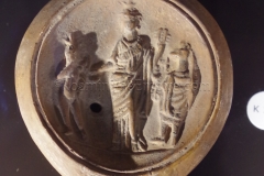 Terracotta lamp with an image of Isis. Displayed in the Musée Calvet.