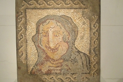 Mosaic of an old woman from Italica, displayed in the MAC Barcelona.