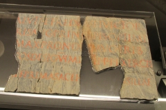 Dedication to Caligula  by a priestess of the cult of Drusilla, Caligula's deceased sister. Found in the excavations of the Republican sanctuary and displayed there.