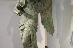 Bronze statue of Victory. From the Capitolium bronze hoard.  Museo di Santa Giulia.