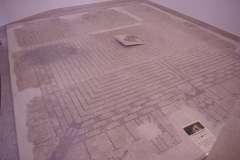 Mosaic of a labyrinth surrounded by a city wall. An emblema of Theseus and the Minotaur was once at the center, but it is no longer extant. Found at Via Carmine. Dated to the 2nd century CE. Museo Archeologico Francesco Ribezzo.