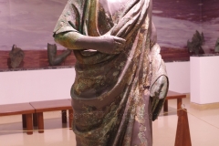 Bronze statue depicting Polydeukion, the favorite pupil of Herodes Atticus. Dated to the 2nd century CE. Found at the Punta del Serrone.  Museo Archeologico Francesco Ribezzo.