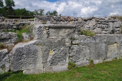 Remaining inscription on the podium of the military amphitheater.