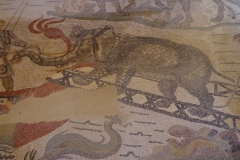 Detail of the Great Hunt mosaic with a scene of an elephant being loaded onto a boat.