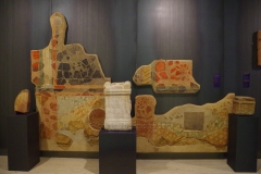 Votive altar to Fortuna from Astorga dated to the 2nd century CE with a backstop of an unrelated architectural fresco dating also to the 2nd century CE from Astorga. Museo de León.