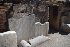 Revetment on the podium of the amphitheater.