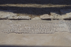 Dedicatory inscription of Eustolios declaring he had given the city baths and would protect it as Apollo had done. At the entrance to the baths of the House of Eustolios.