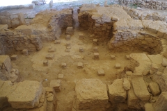 Baths with hypocaust system in the House of Eustolios.