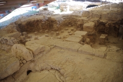 Baths with hypocaust system in the House of Eustolios.