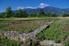 Baths between the Hellenistic Theater and Sanctuary of Zeus Olympis, Mount Olympus in the background.