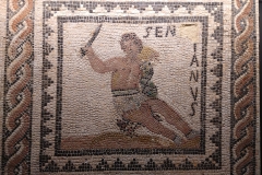 Mosaic depicting the retiarius gladiator Senilianus, one panel in a larger mosaic. Dated to the 2nd or 3rd century CE. Discovered locally at the Place Coislin . Musée de La Cour d'Or de Metz.