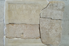 Honorific inscription of Marcus Cornelius Nigrinus Curiatius Maternus, consul suffectus in 83 CE. Displayed at the archaeological museum.