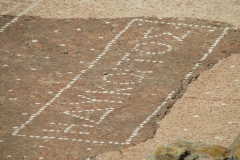 Detail of the Greek mosaic inscription reading 'ΗΔΥΚΟΙΤΟΣ', "how sweet it is to be reclined".