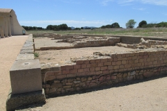 Tabernae along the western edge of the forum.