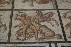 Detail of the Labors of Hercules mosaic depicting Hercules and the mares of Diomedes.