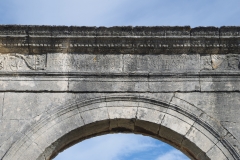 Detail of the inscription on the western arch of the Pont Flavien.