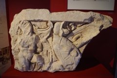 Relief depicting a Gallic prisoner and armaments.
