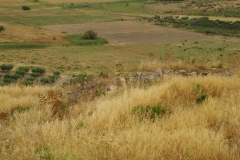 Upper fortifications on the north side of the hill.