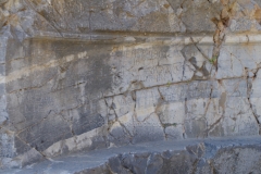 Detail of the inscription on the rock-cut exedra.