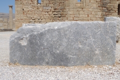 Statue base from the lower terrace dedicated to Zeus Polieus by Polykles, a priest of Athena Lindia, in 313 BCE . Part of a set of three; the other two dedicated to Athena Lindia and Apollo Pythios.