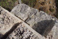 Quarrying remains across the northern inlet.