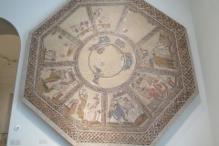 Mosaic of the Muses, which depicts each of the Muses with a master in their art; Calliope with Homer, Thalia with Menander, etc.. Dated to the 4th century CE, from Arellano, Spain.