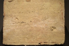 Clay plaque with the first lines of the Aeneid inscribed in a cursive script. Dated to the 1st century CE, from Italica (Santiponce).