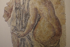 Mosaic of a bather from the 3rd century CE. In the Musée des Docks Romains.