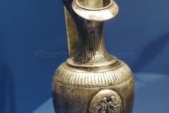 Bronze vessel with an image of Apollo and Terpsichore. Dated to the 1st century CE and displayed in the Musée de la Romanité.