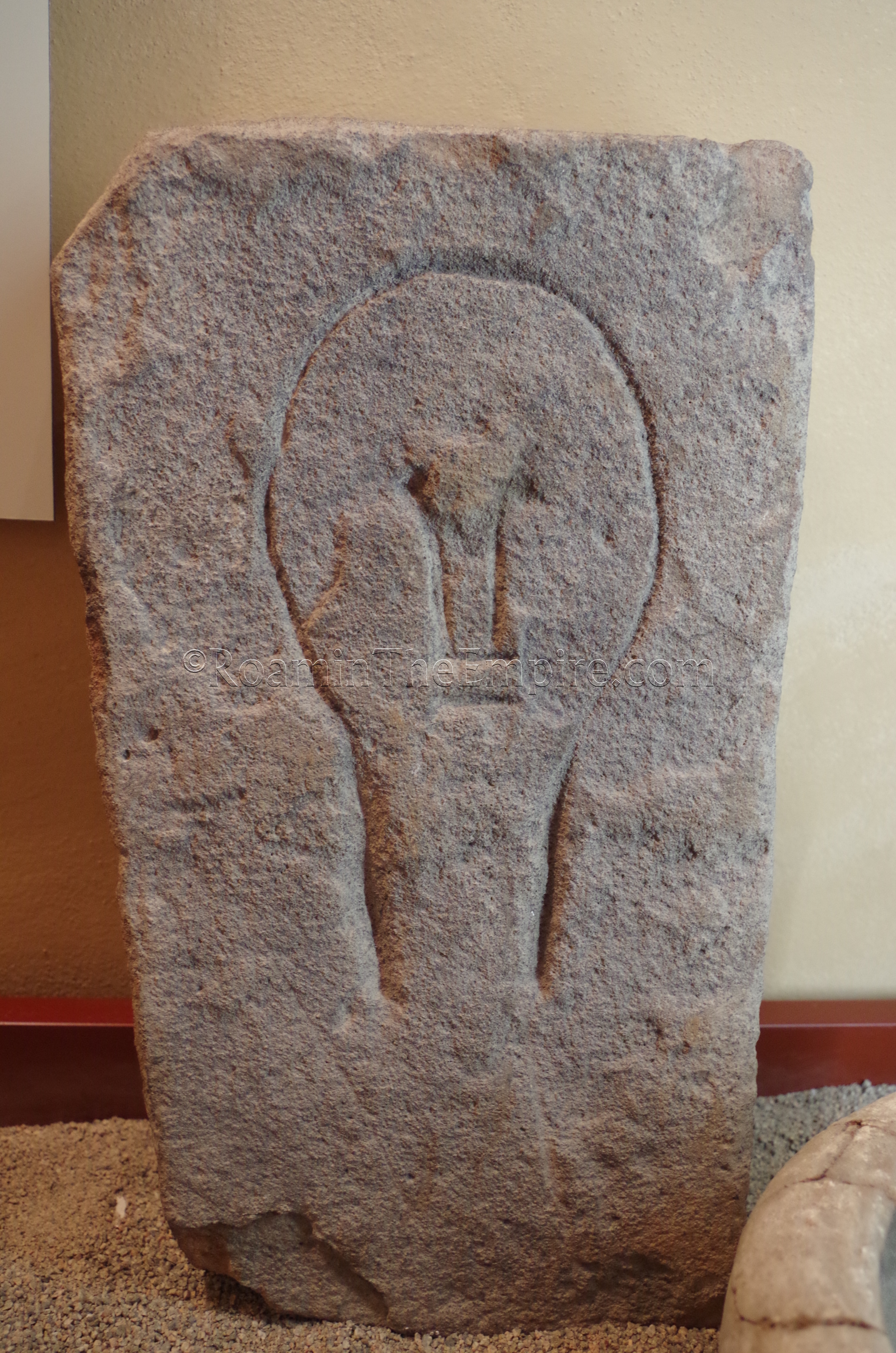 Roman stele with Punic style head. Museo Archeologico Alle Clarisse.