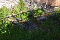 Drainage out of the Chiesa Santa Maria di Bubalis baths on the northwest.