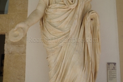 Statue restored with a modern head of Marcus Aurelius, from Tindari. The body is dated to 35-40 CE.