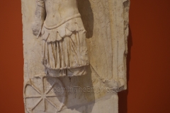 Marble votive relief depicting Nemesis, who had a sanctuary near the stadium, according to Pausanias. Dated to the 2nd century CE. Archaeological Museum of Patras.