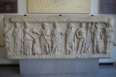 Frieze from a temple of health gods depicting Iaso, Panacea, Telesphorus, Asclepius, Hygieia, Epione, Machaon, and Podalirius. Found at Tsar Shishman Square in Plovdiv and dated to the 3rd century CE. Regional Archaeological Museum.