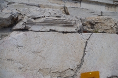 Inscription on the parapet of the theater.