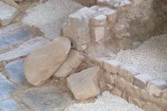 Buffer stones on the corner of the Northern House at Vía del Pòrtic.