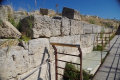 Wall below the acropolis and area of Latin inscription.