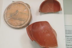 Fragments of pottery with incised graffiti from the fill of the foundations of the aqueduct.